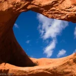 A side-view of Pinto Arch that makes it look like a heart. Moab, Utah